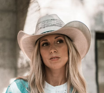 Woman in white cowboy hat
